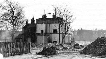 Domville Grove, 1978. Within a year these houses were gone before being covered over by the grass of Burgess Park.  X.png
