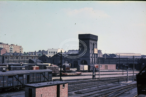 Bricklayers Arms Railway c1964, looking towards Dunton Road. Fawkham House Flats, Seytchell Road are on the left and the white building was The Greyhound Pub.  X.png
