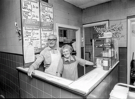 Redriff Road, Charlie, and Lillian Lunn in their cafe on the Redriff Estate, Rotherhithe.  X..png