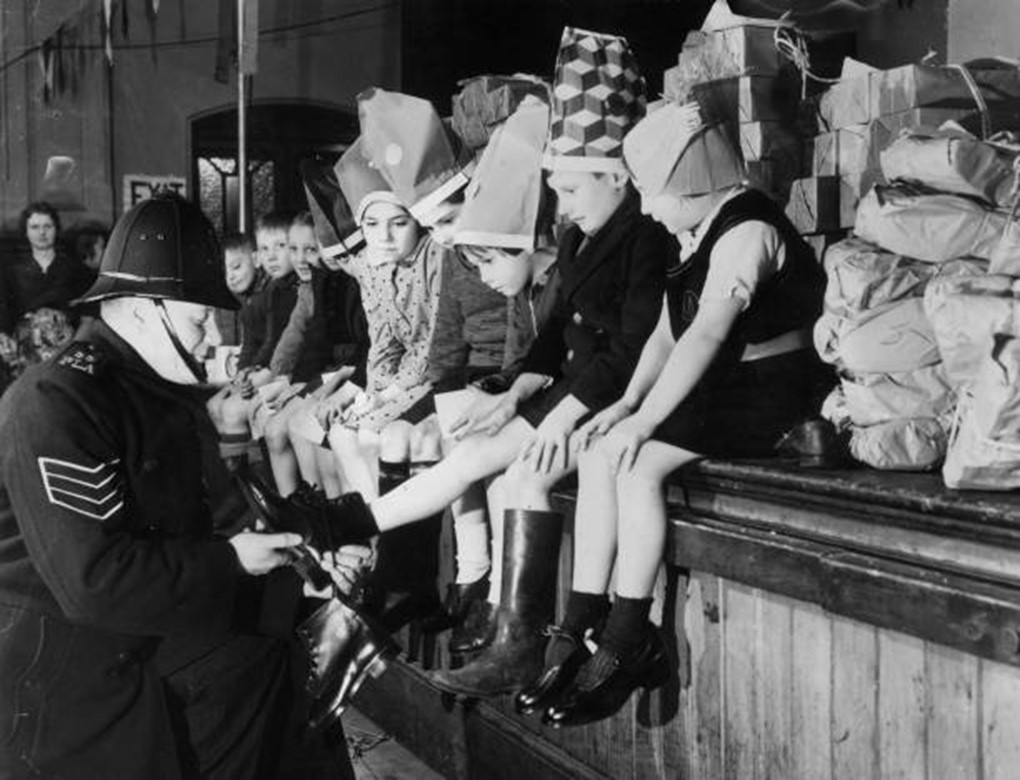 Surrey Commercial Dock, 1938, Children from the Docklands area at their annual Christmas treat.    X..jpg