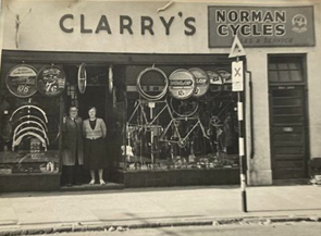 9. East Street, Clarence and Minnie Dagwell and one of the stickers they used to put on bikes. 1.  X..png