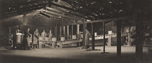 Surrey Commercial Docks 1906, men loading Cheese.      X..png