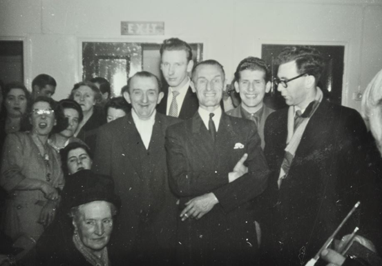 Brandon Street Club, c1955. Residents enjoying the opening of the Club.  X..png