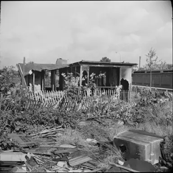 Rolls Road, prefabs being demolished, 1962. 1 X..png