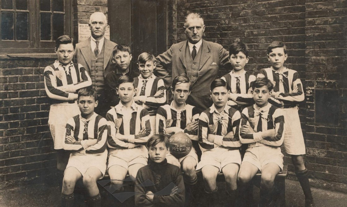 1. Cornwall Road,  St Patrick's Primary School Senior Football team c1930. Marcel Lavelli is the boy in the centre behind those seated.   X..jpg