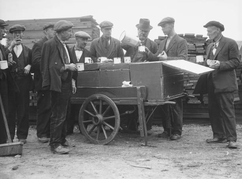 Surrey Commercial Dock, Alf Brewster, supplies tea to the dockers, c1935..jpg