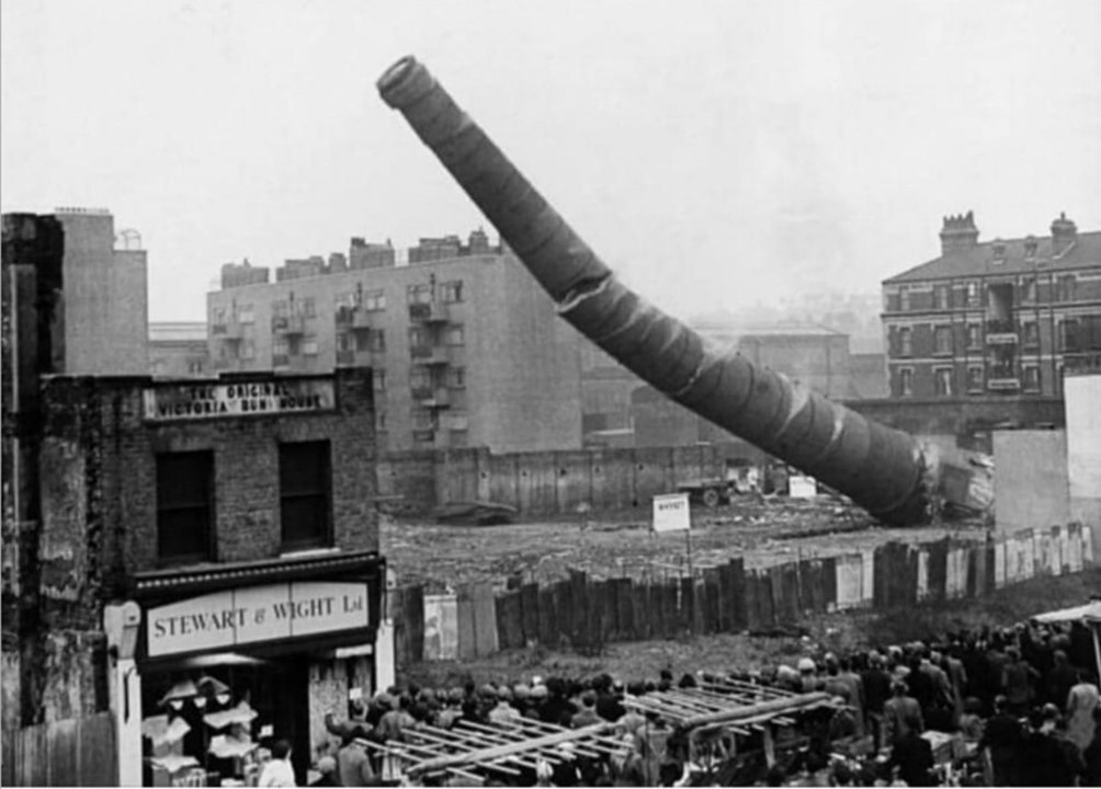 The Cut and Windmill Walk 1951. The massive former boiler house chimney behind the row of shops along the Cut and just off Windmill Walk, standing directly opposite Cons Street.  2. X..jpg
