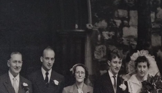 Nursery Row,  from left to right, Henry Harry Sage Sr,  Henry Harry boy Sage Jr,  Louisa Lou-Lou Sage-nee Atkins, John Johnny boy Sage,  Daisy Sage-Nee Hance, St John's Church in 1954.   X..png