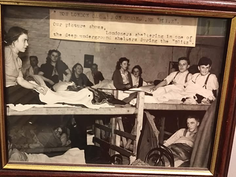 Baylis Road, Waterloo during the Blitz, the three men on the left were all members of the Doyle family.  X..png