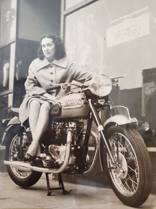 Old Kent Road, Connie Osgood outside the bike shop of Osgood and Coates.  1. X..png