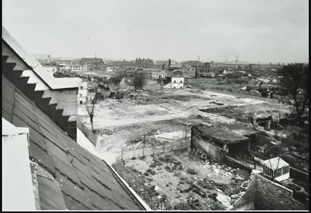 Old Kent Road. It appears the picture was taken from an upper floor window of The Rising Sun Pub, located at  799 Old Kent Road.  X..png