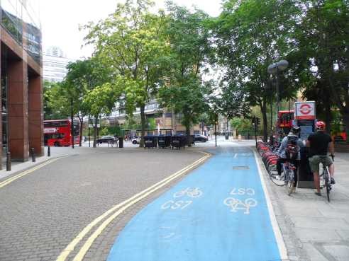 Film Adventure in the Hopfield’s, 1954. Same location 2018. The only buildings still standing are those on Princess Street, beyond the greenery in the right distance.  2018.jpg