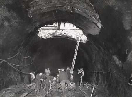 Surrey Docks Underground station, bomb damage on the track.   X.png