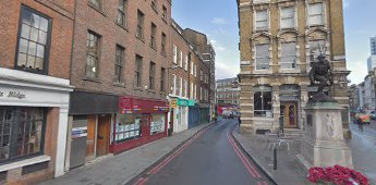 Borough High Street, 2020, on the left just pass the green sign was an alley called Boars Head Inn. c1800.  X.png