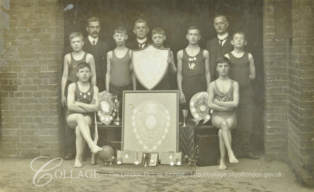 Rodney Road, Victory Place School, group of boys and teacher with sports trophies c1908. X.png